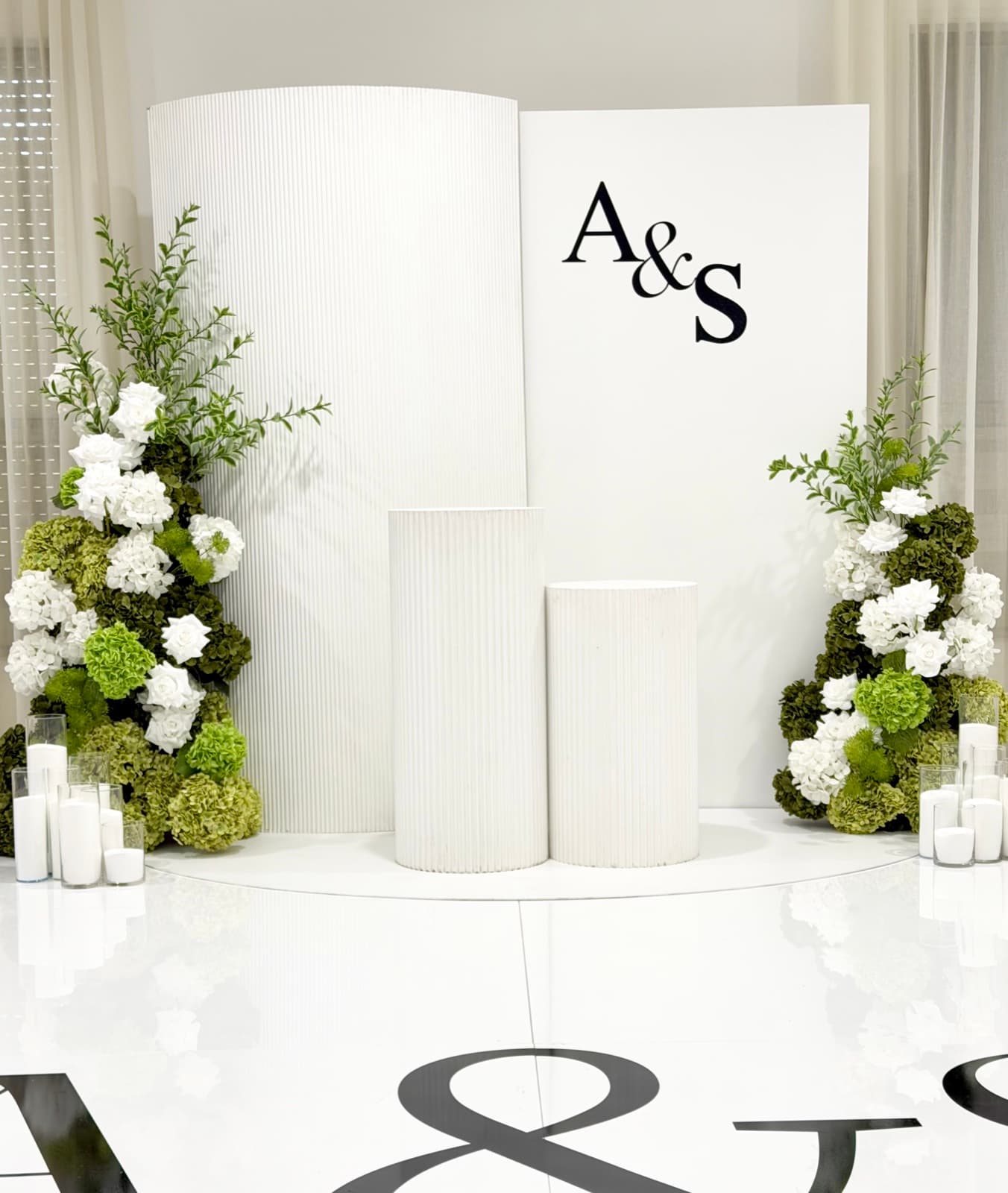 Baby shower event styling with pastel decorations and balloon arrangements