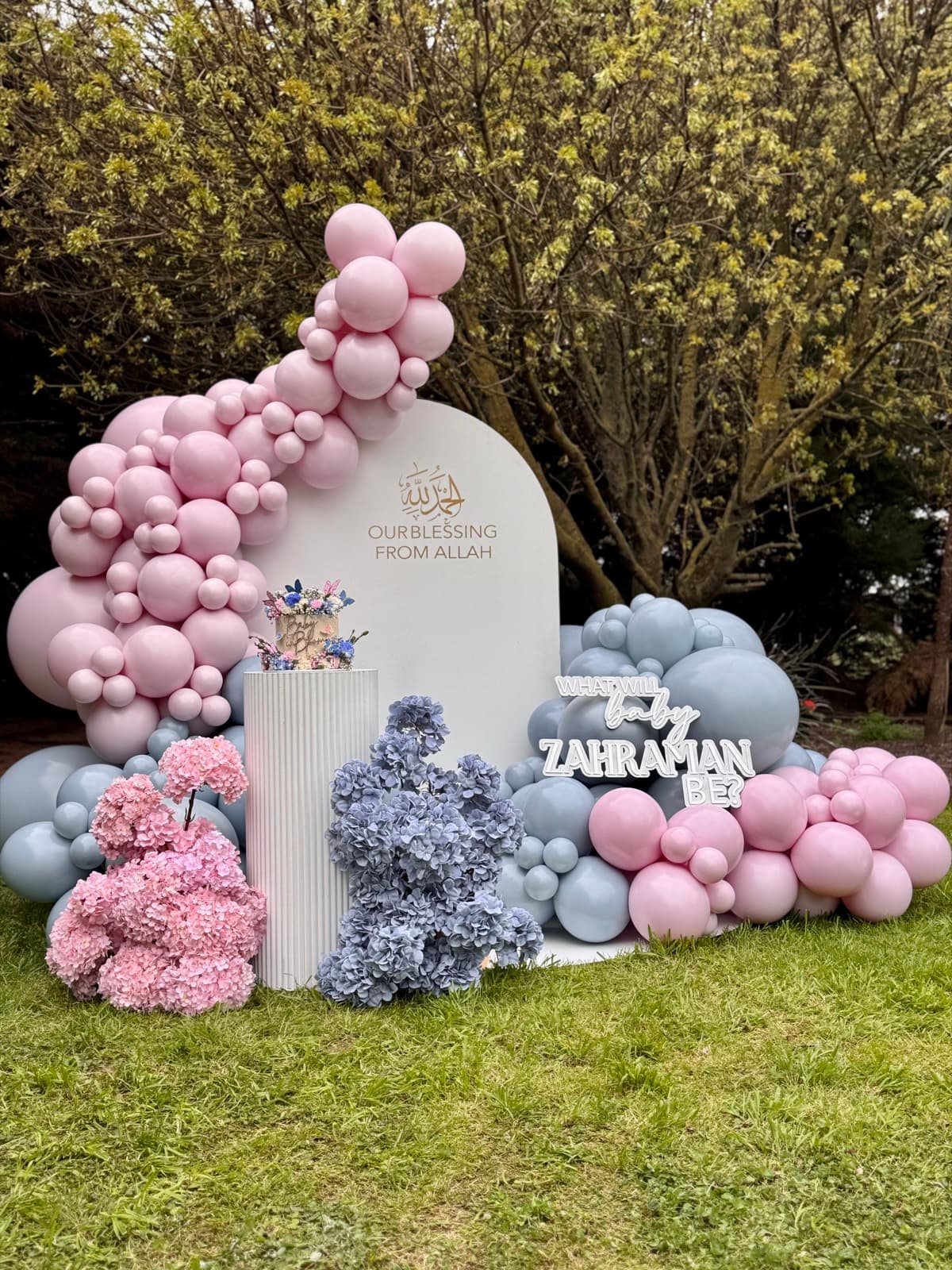 Birthday party styling with balloon installations and themed decorations