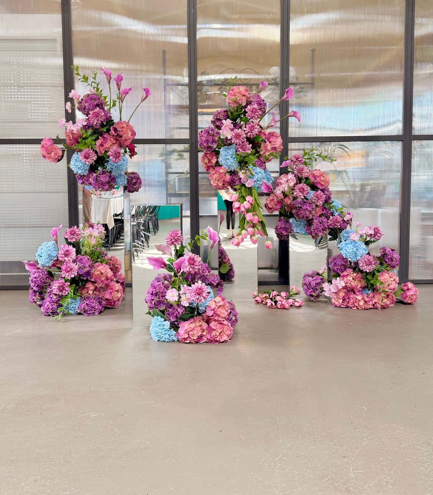 Birthday party styling with balloon installations and themed decorations