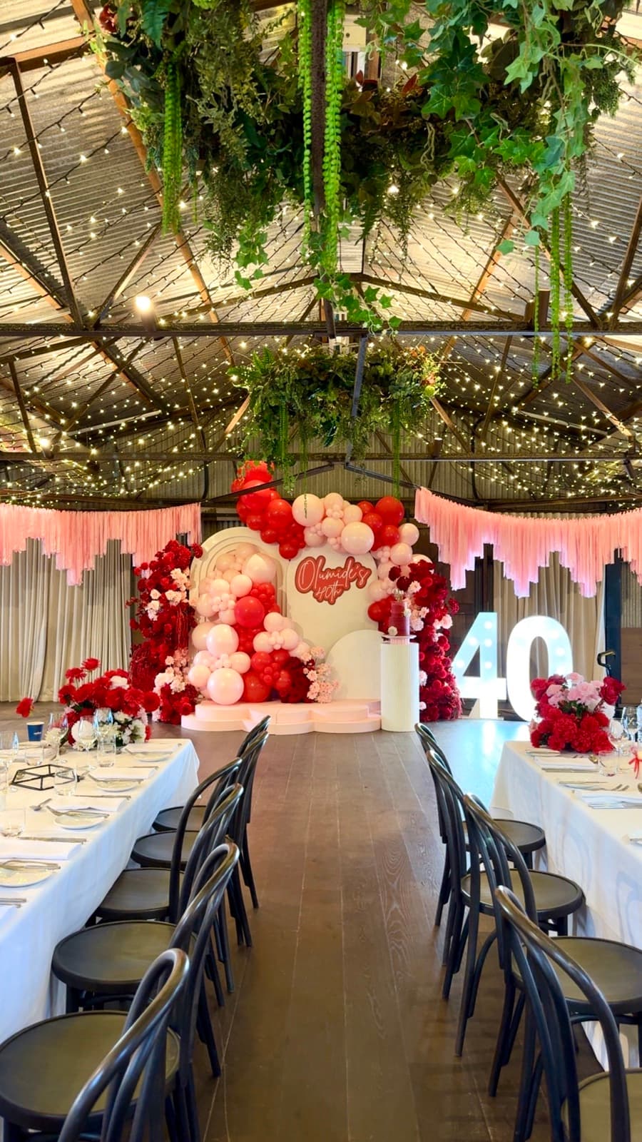 Birthday party styling with balloon installations and themed decorations