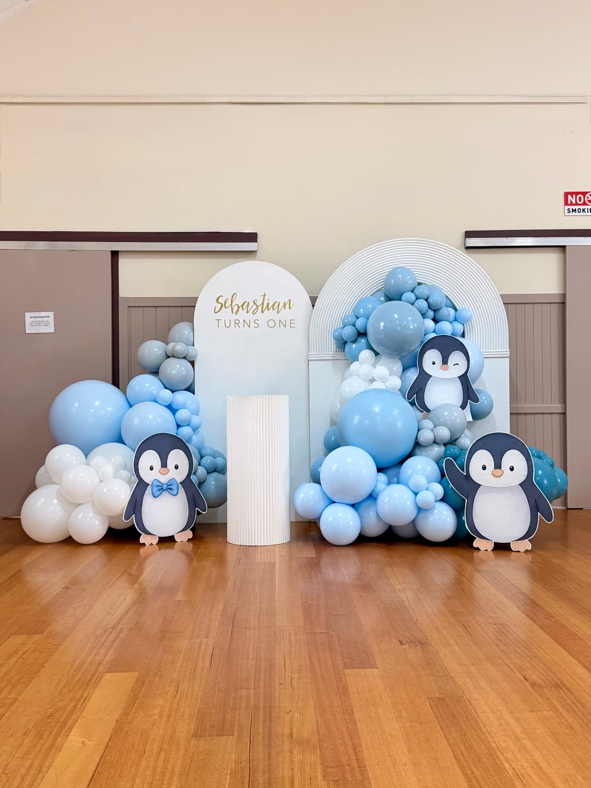 Birthday party styling with balloon installations and themed decorations