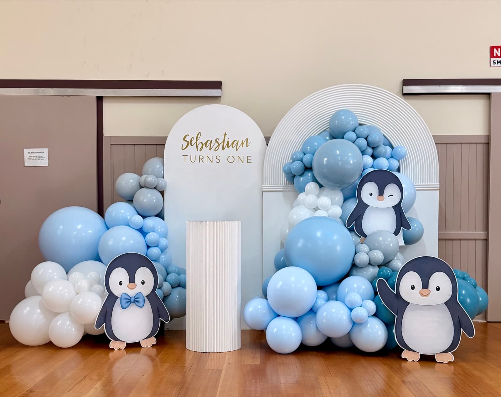 Birthday party styling with balloon installations and themed decorations