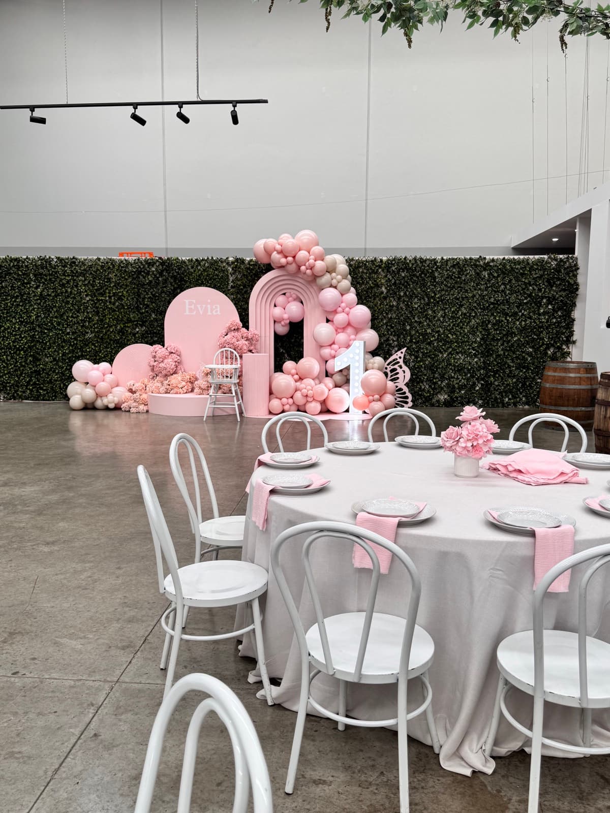 Birthday party styling with balloon installations and themed decorations