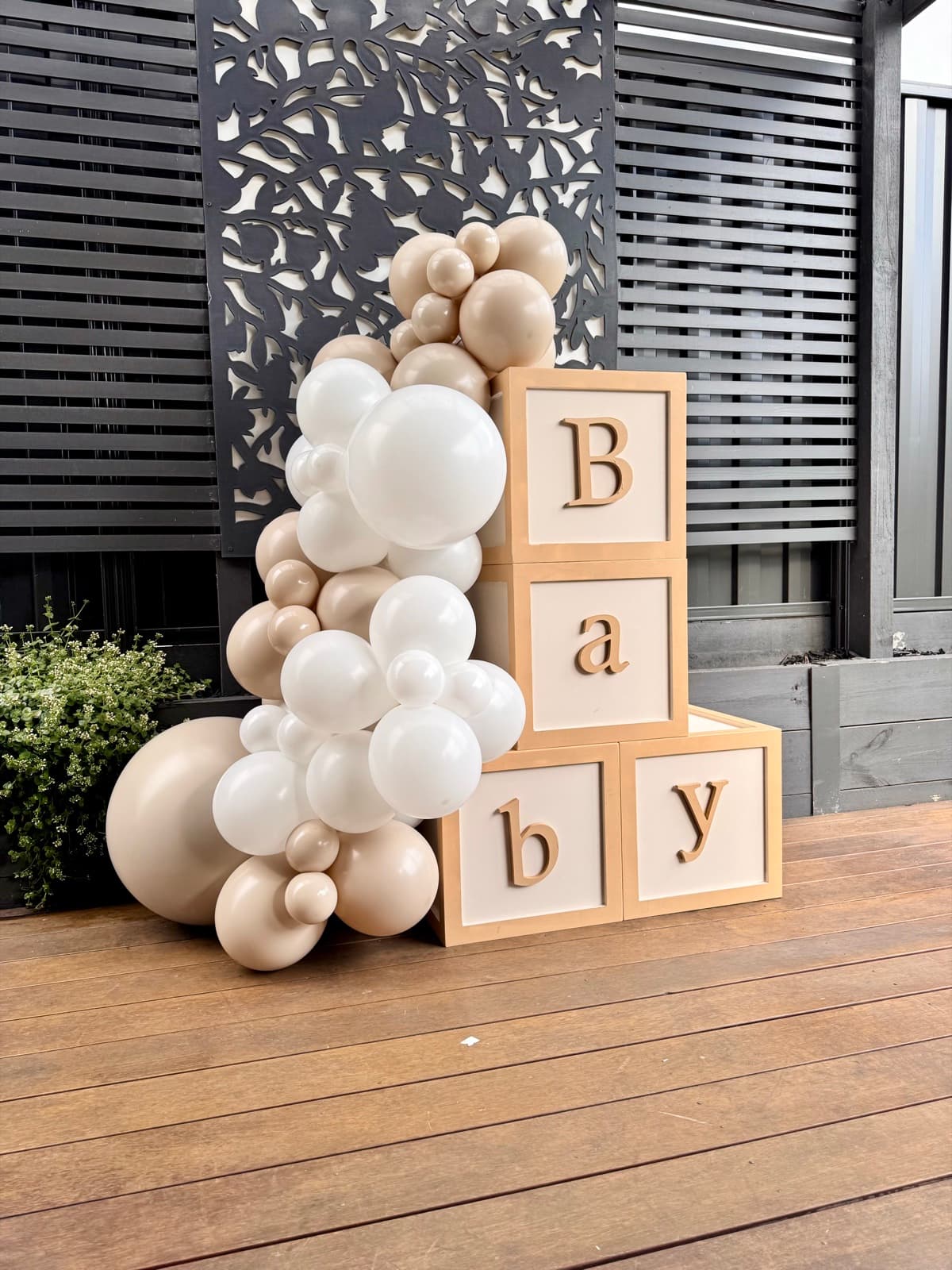 Birthday party styling with balloon installations and themed decorations