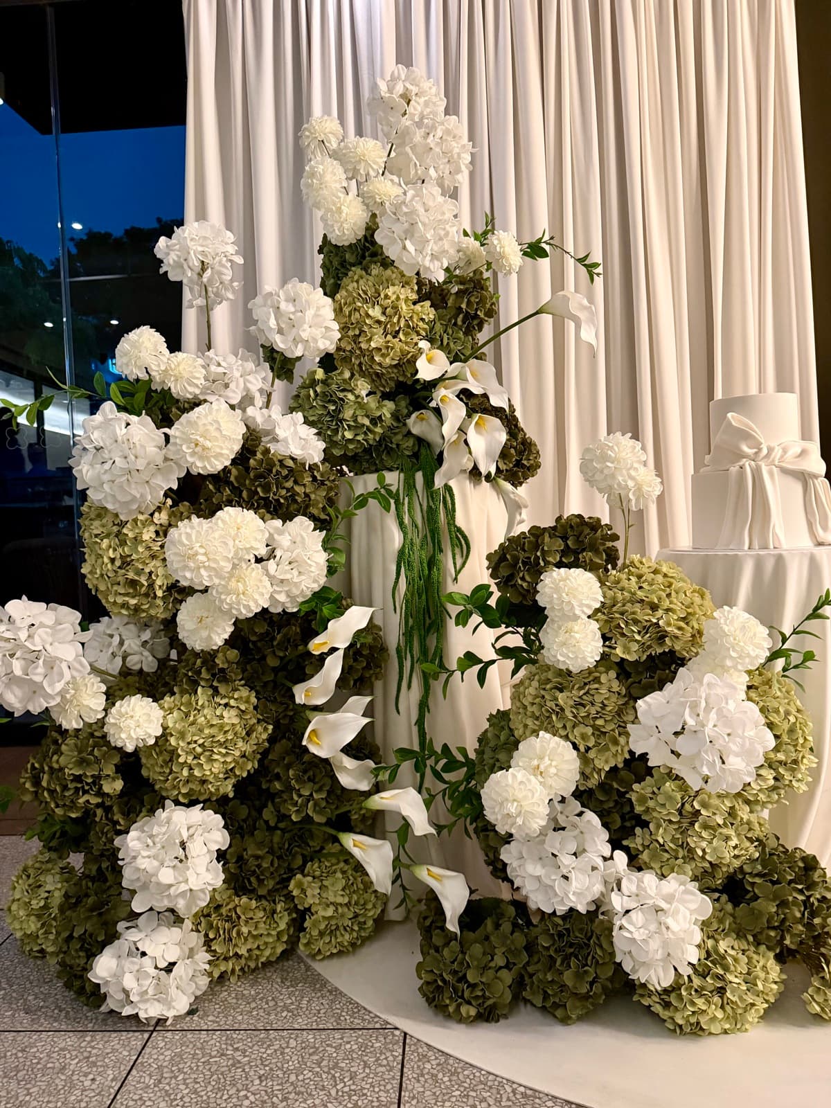 Engagement party styling with floral arrangements and elegant backdrops