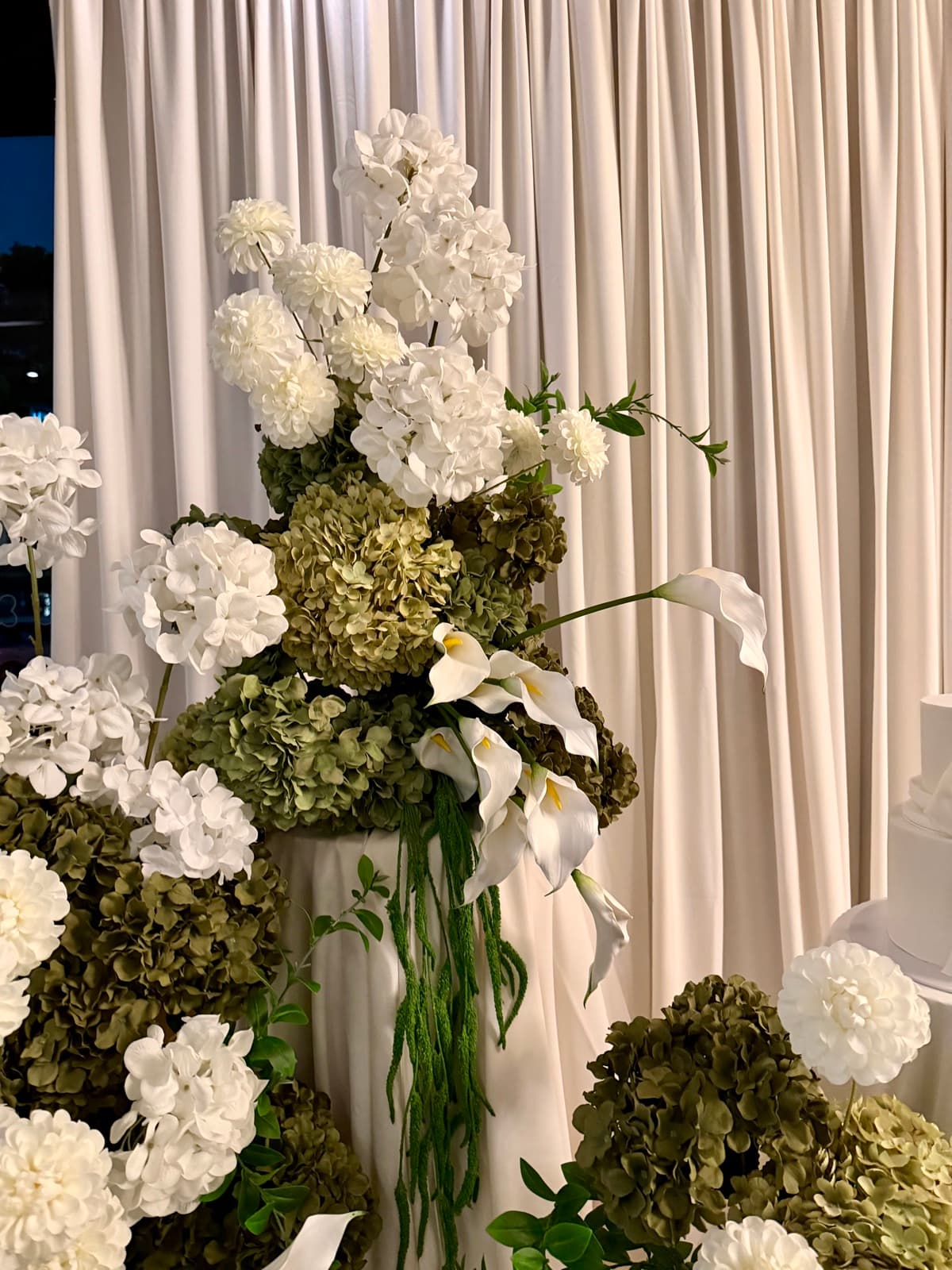 Engagement party styling with floral arrangements and elegant backdrops
