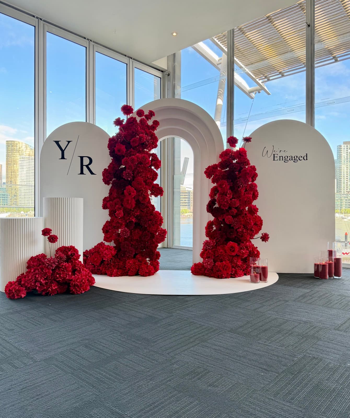 Engagement party styling with floral arrangements and elegant backdrops