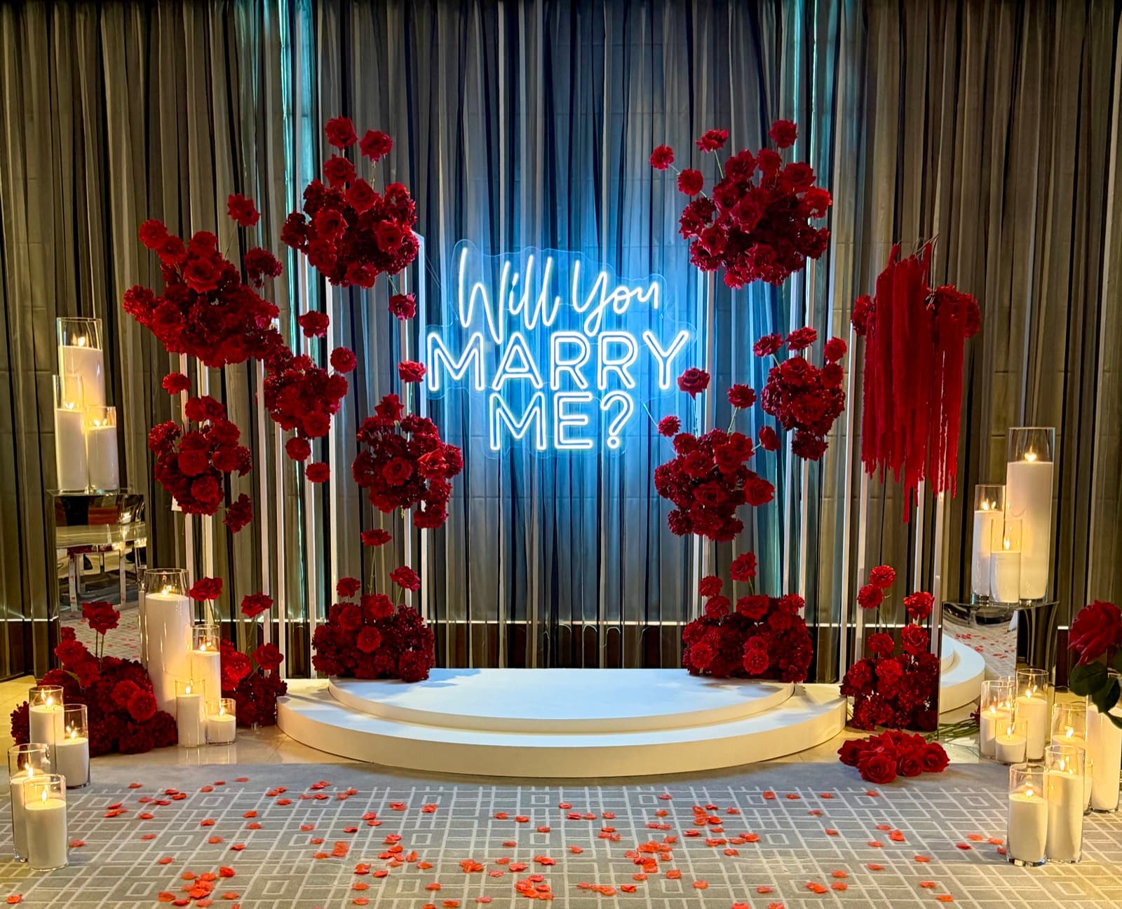 Engagement party styling with floral arrangements and elegant backdrops