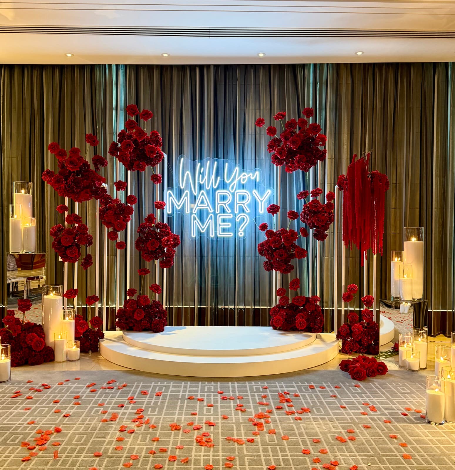 Engagement party styling with floral arrangements and elegant backdrops